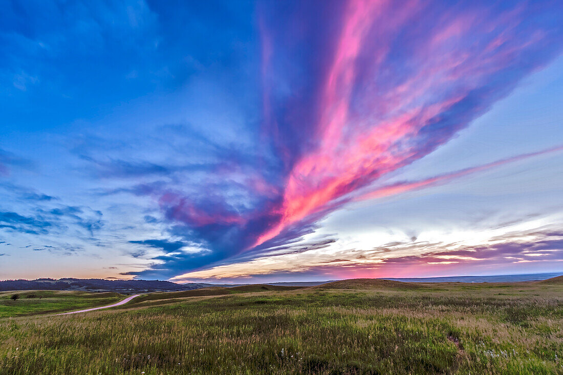 Sunset at the Reesor Ranch, on the edge of the Cypress Hills, on the Alberta-Saskatchewan border, July 4, 2014. This is a high dynamic range stack of 6 exposures at 2/3rds stop intervals, with the Canon 60Da and 10-22mm lens.