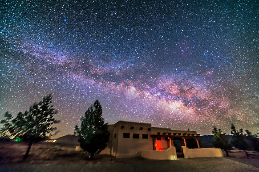 The northern summer Milky Way rising into the east. Taken from the Painted Pony Resort, New Mexico, March 10, 2013. This is a stack of 10 x 5 minute tracked exposures with the Samyang 14mm lens at f/2.8 and Canon 5D MkII at ISO 800. Used iOptron SkyTracker. Ground is from two exposures.
