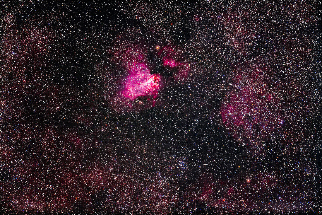 Messier 17, the Swan Nebula, aka the Omega or Checkmark Nebula, with the open cluster M18 below it.