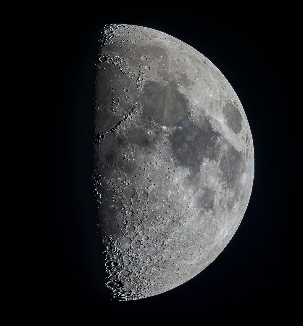 A panorama of the 8-day-old first quarter Moon on March 14, 2019, showing the full disk and extent of incredible detail along the terminator, the dividing line between the day and night sides of the Moon where the Sun is rising as seen from the surface of the Moon.