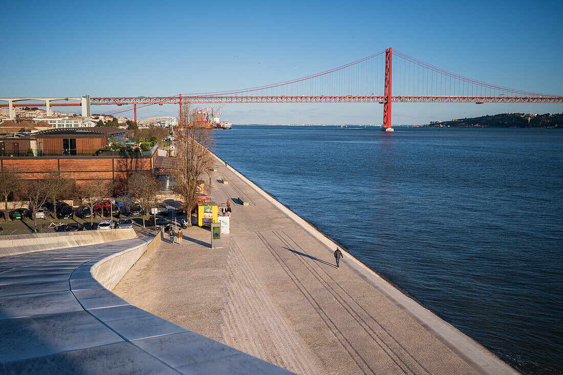 View of Ponte 25 de Abril bridge from MAAT (Museum of Art, Architecture and Technology) roof, designed by the British architect Amanda Levete, Belem, Lisbon, Portugal