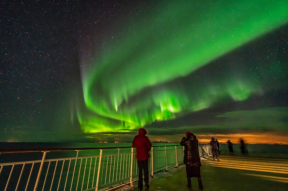 The Northern Lights from at sea when leaving the Lofoten Islands, Norway heading toward the mainlaind, from Stamsund to Bodo, March 3, 2019. This was from the Hurtigruten ship the ms Trollfjord. Orion is setting in the west at left. This is looking northwest. This display was with a Kp Index of only 1 or 2 and was active and bright only briefly around midnight.