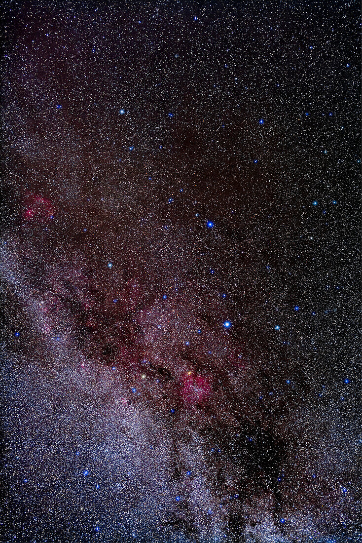A portrait of the northern autumn constellation of Cepheus the King. The large red nebula at the bottom (to the south) is IC 1396. Mu Cephei is the red star, aka the Garnet Star, on its edge.