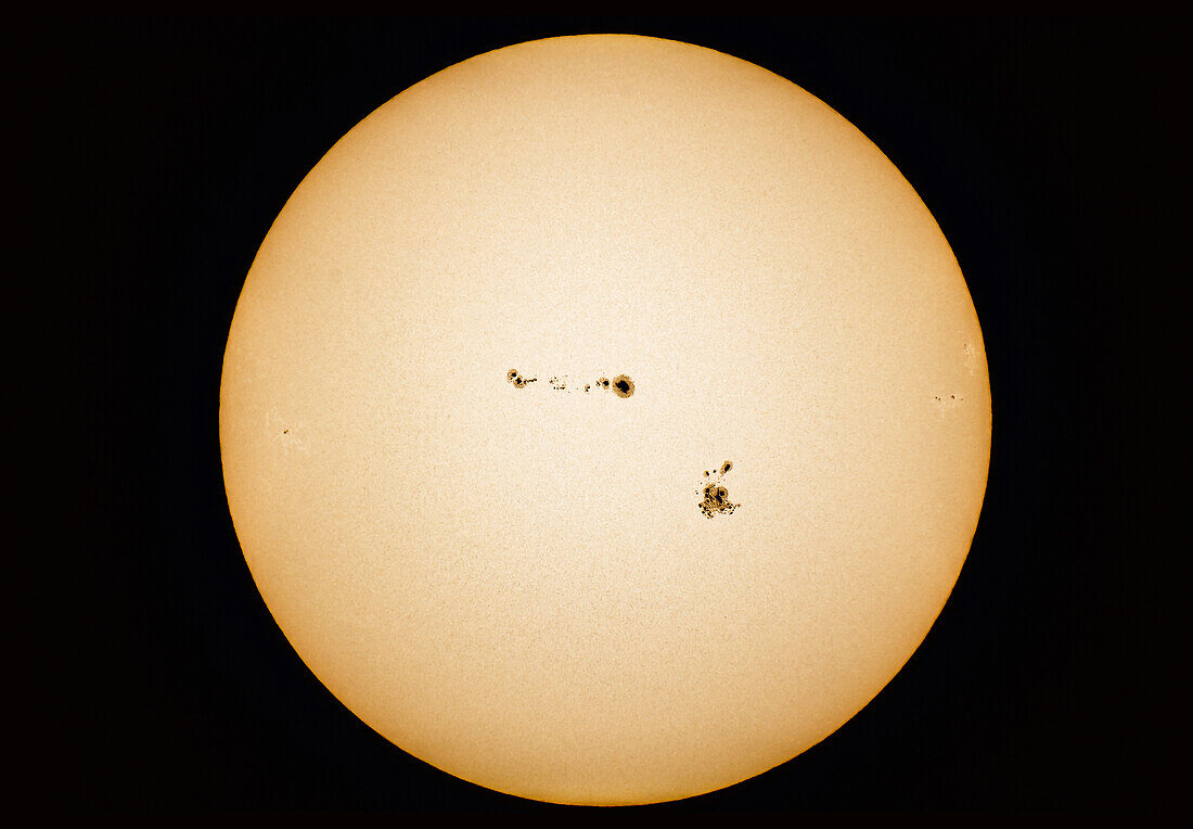 Particularly large groups of sunspots on the Sun on September 4, 2017. The group at bottom is AR 2673, the group at top is 2674. The small spot at left on the emerging limb is AR 2677, while the groups disappearing at right are AR 2675 (top) and AR 2776.