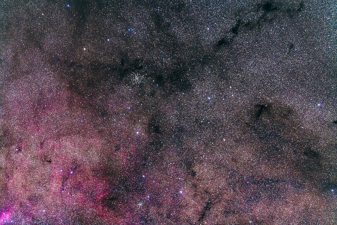 The wonderful open star clusrter NGC 6124 in Scorpius amid a field of dark nebulas and on the edge of a bright star cloud with red emission nebulosity. I call this the Dark River Cluster.