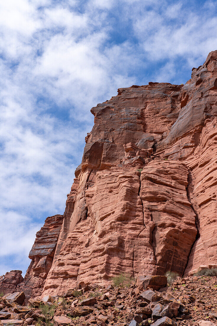 Red cliffs of Talampaya Formation sandstone at the Puerta del Cañon in Talampaya National Park, Argentina.