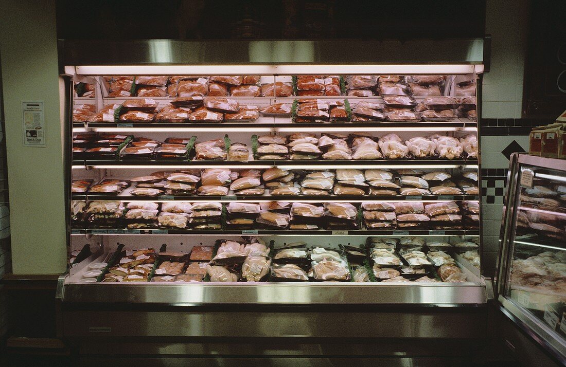 Meat and poultry shelf in a supermarket