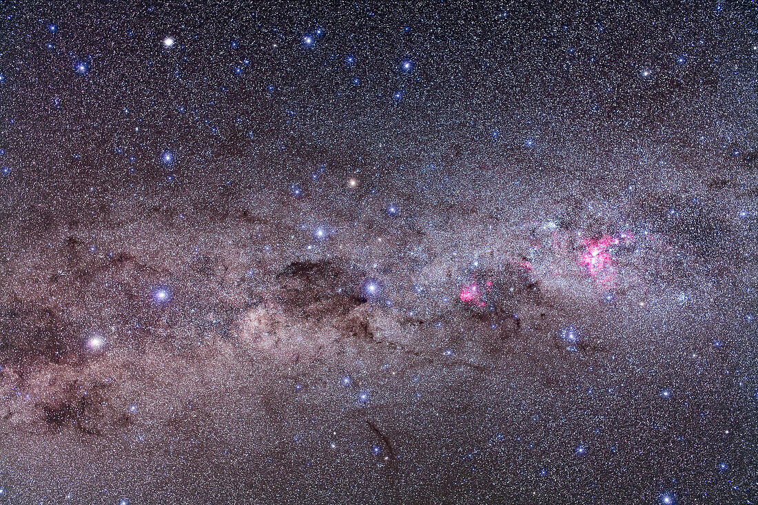 Area of southern Milky Way containing Eta Carinae, Crux and Alpha & Beta Centaurus, taken from Atacama Lodge, Chile, March 2010, with Canon 5D MkII (modified) and Sigma 50mm lens at f/4 for stack of 4 x 6 minute exposures at ISO 800 plus stack of 4 x 6 minutes with Kenko Softon filter for star glows.