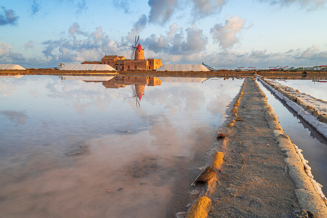 Reflection of the windmill in the salt flats at dawn, Saline Ettore e Infersa, Marsala, province of Trapani, Sicily, Italy, Mediterranean, Europe