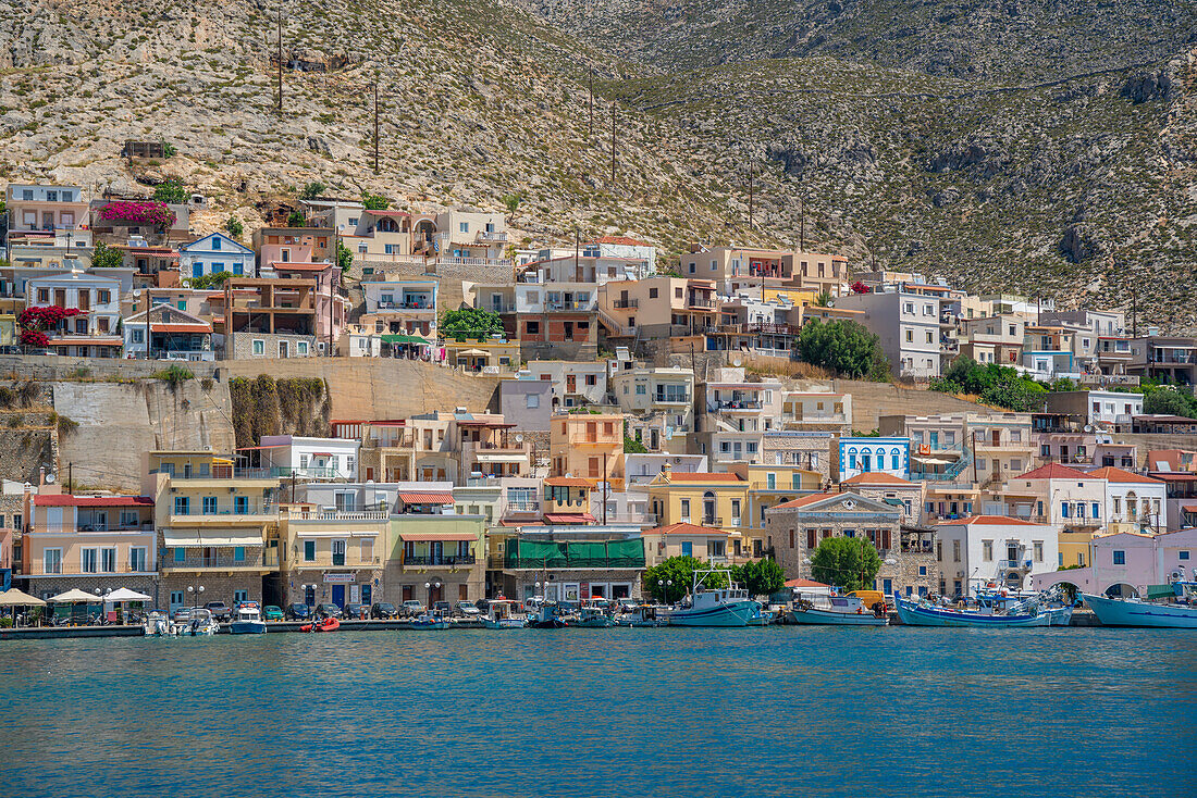 View of port and town of Kalimnos with hills in the background, Kalimnos, Dodecanese Islands, Greek Islands, Greece, Europe