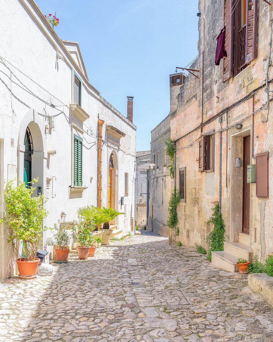 Narrow cobbled street in the old town of Matera, Basilicata, Italy, Europe