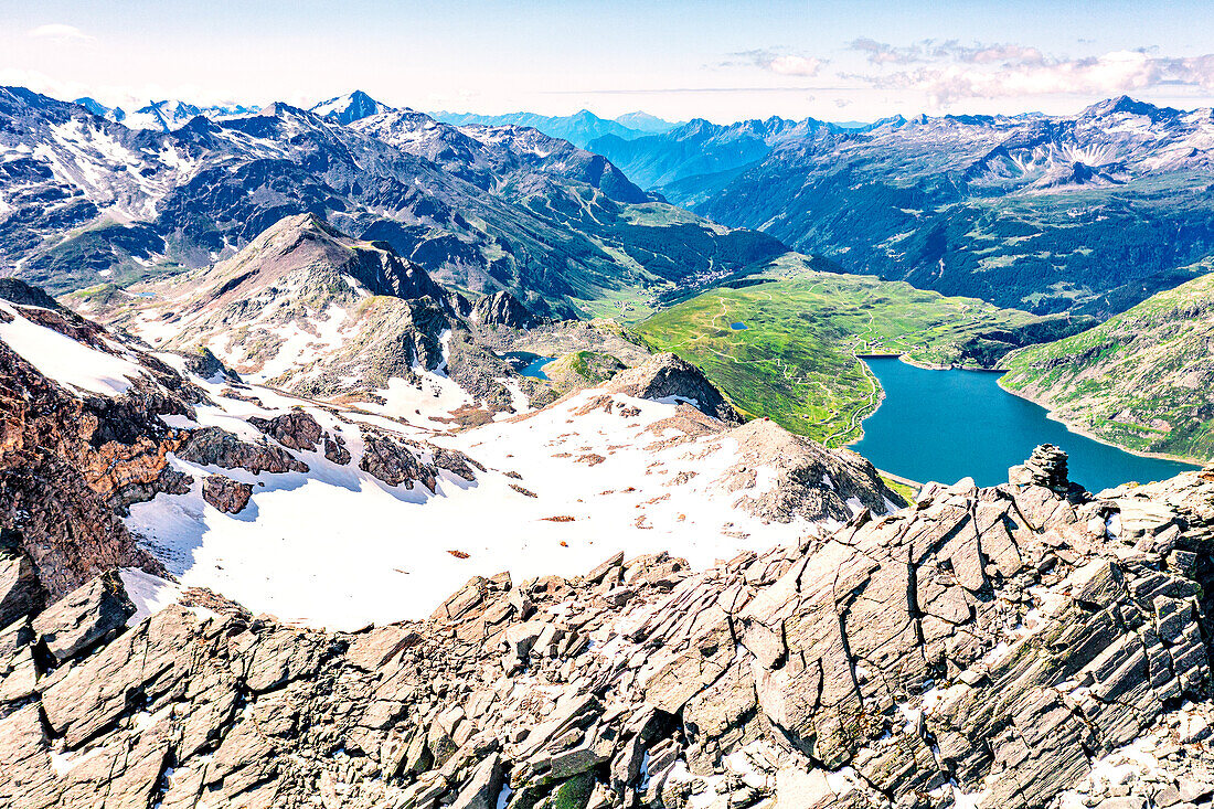 Aerial panoramic of lake Montespluga and Pizzo Suretta mountain peak, Madesimo, Valle Spluga, Valtellina, Lombardy, Italy, Europe