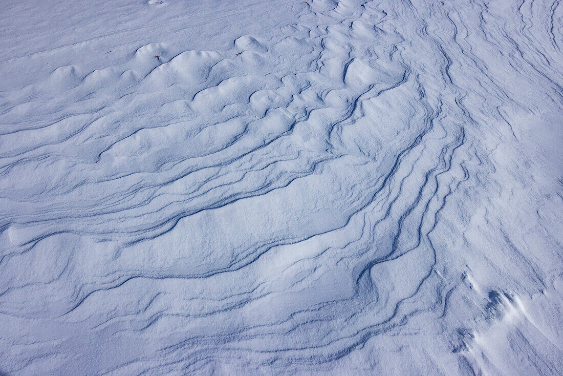 Abstract patterns on snow, full frame