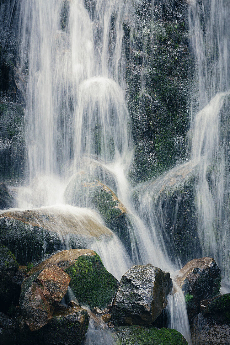 Ukraine, Ivano Frankivsk region, Verkhovyna district, Dzembronskie waterfalls, Large waterfall falling on mossy rocks