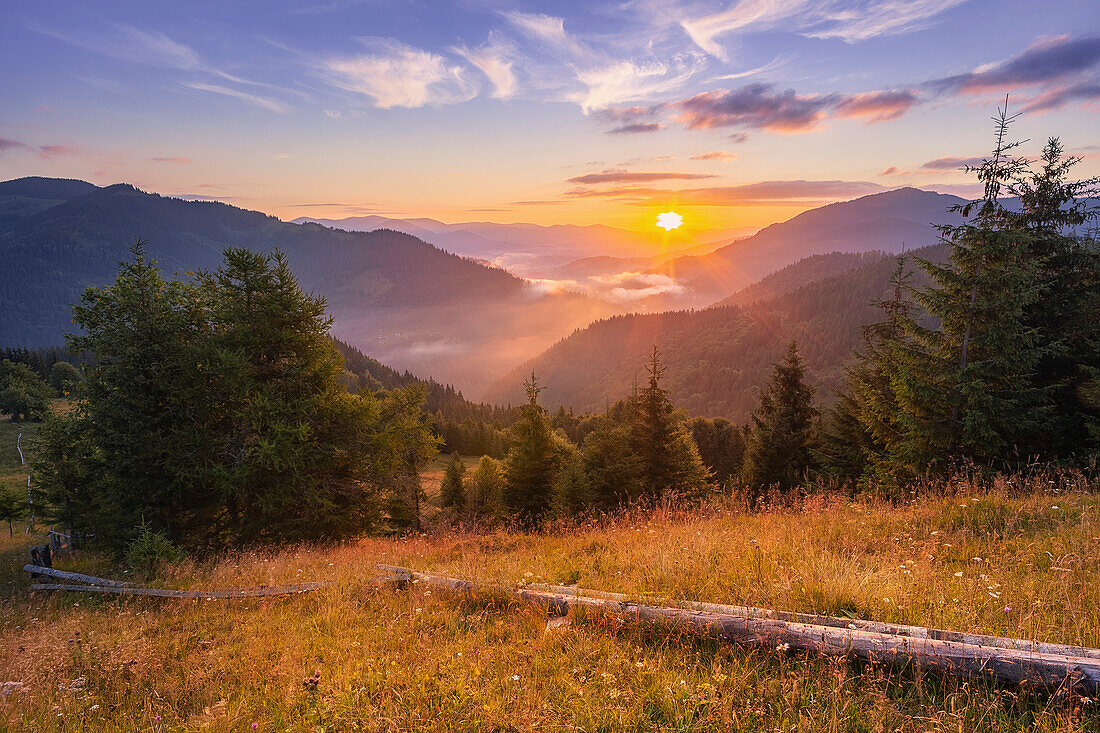 Ukraine, Ivano Frankivsk region, Verkhovyna district, Dzembronya village, Carpathian Mountains landscape at sunset