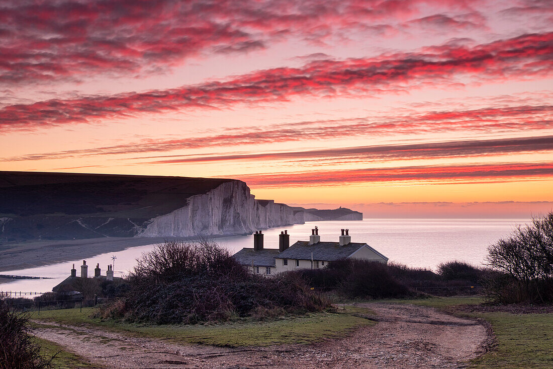 The Seven Sisters white chalk cliffs at dawn from Cuckmere Haven, South Downs National Park, East Sussex, England, United Kingdom, Europe