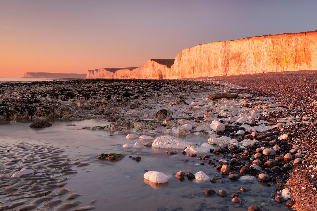 The Seven Sisters chalk cliffs at sunset, Birling Gap, South Downs National Park, East Sussex, England, United Kingdom, Europe