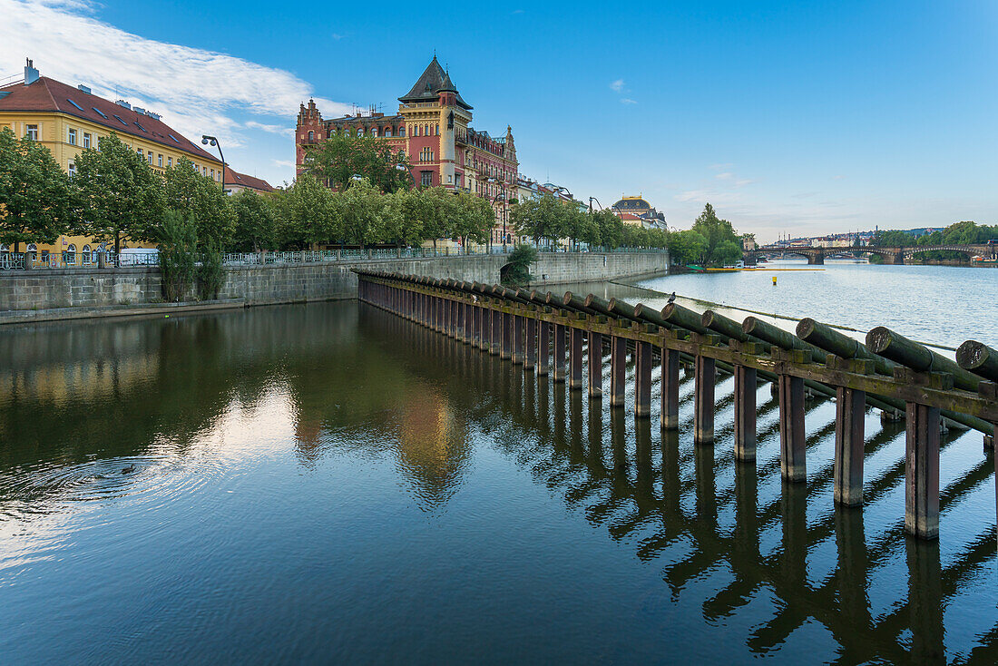 Historic Bellevue building and wooden icebreaker on Vltava River, Prague, Bohemia, Czech Republic (Czechia), Europe