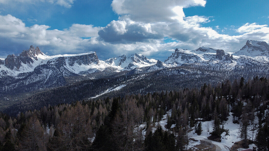 Panorama view of Croda da Lago, Lastoni di Formin, Ra gusela, Nuvolao, Cinque torri and Cortina d'Ampezzo Dolomites mountain covered in pristine snow, Italy, Europe