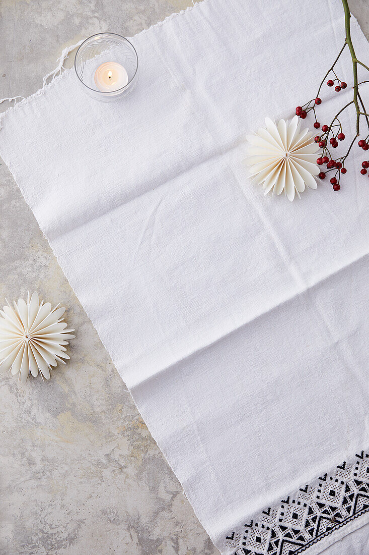 White tablecloth with Christmas decorations