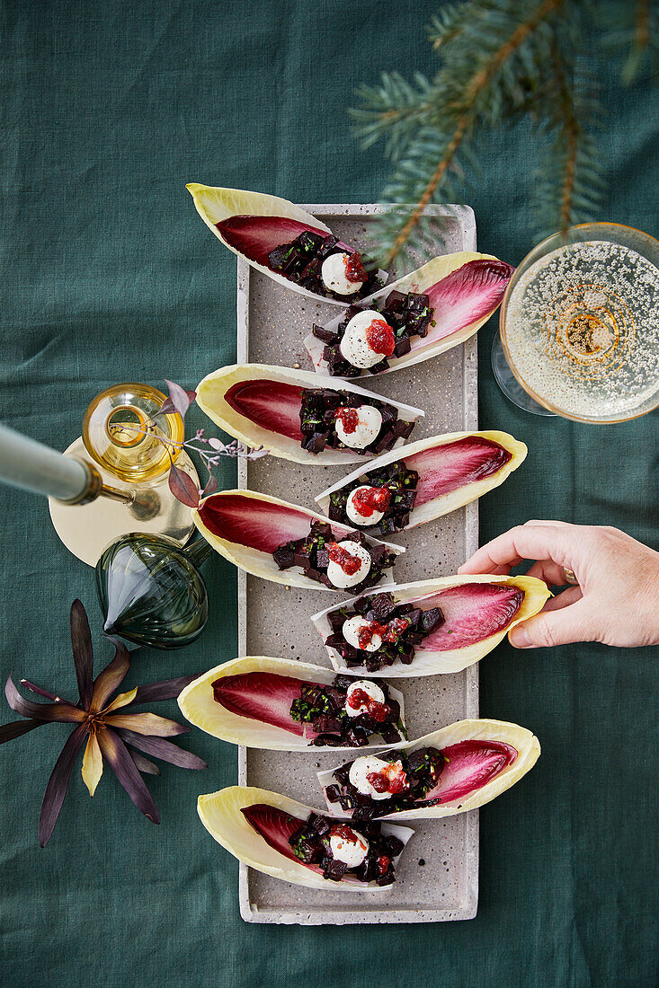 Braised beetroot in chicory boats