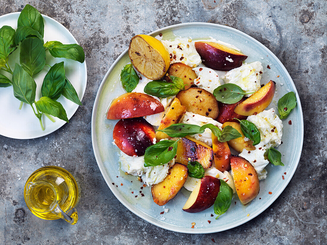 Mozzarella with grilled nectarines, basil, olive oil, and chili flakes