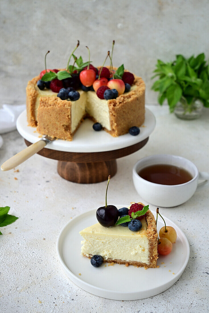 Classic cheesecake with berries and cherries