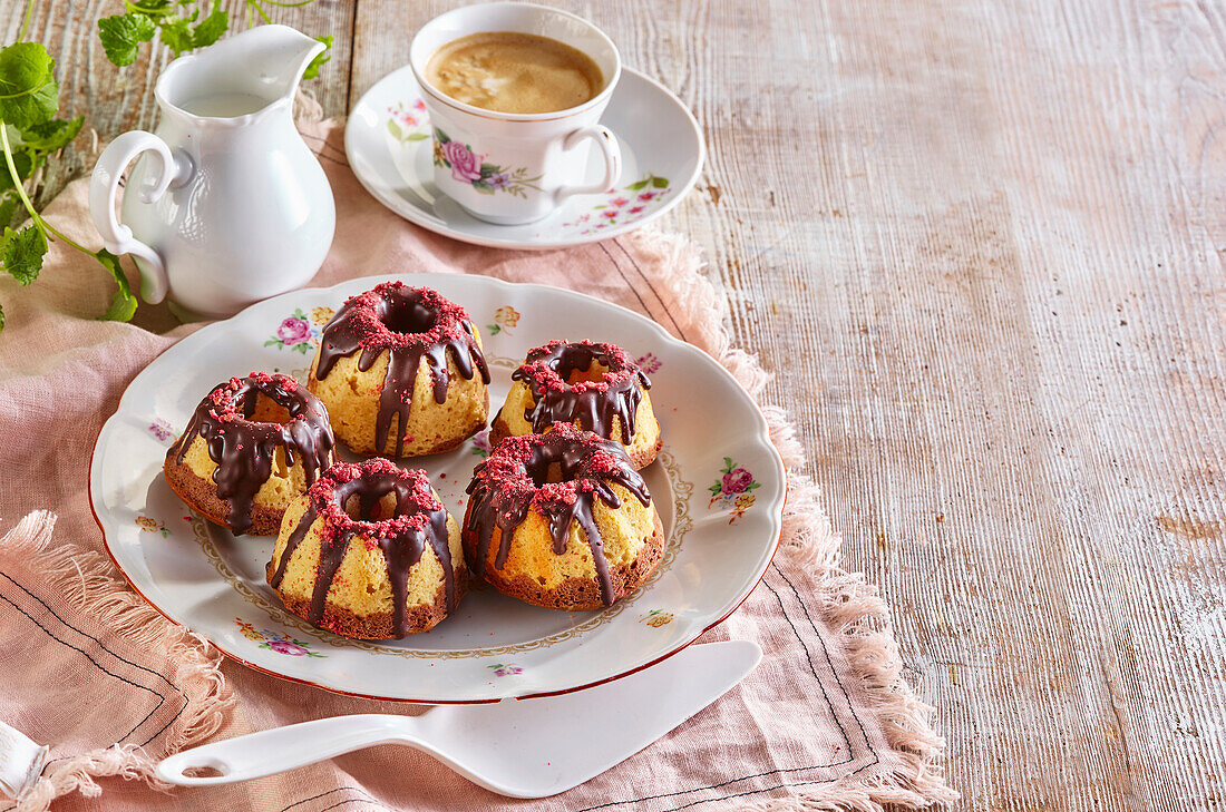 Mini bundt cakes with curd and chocolate icing