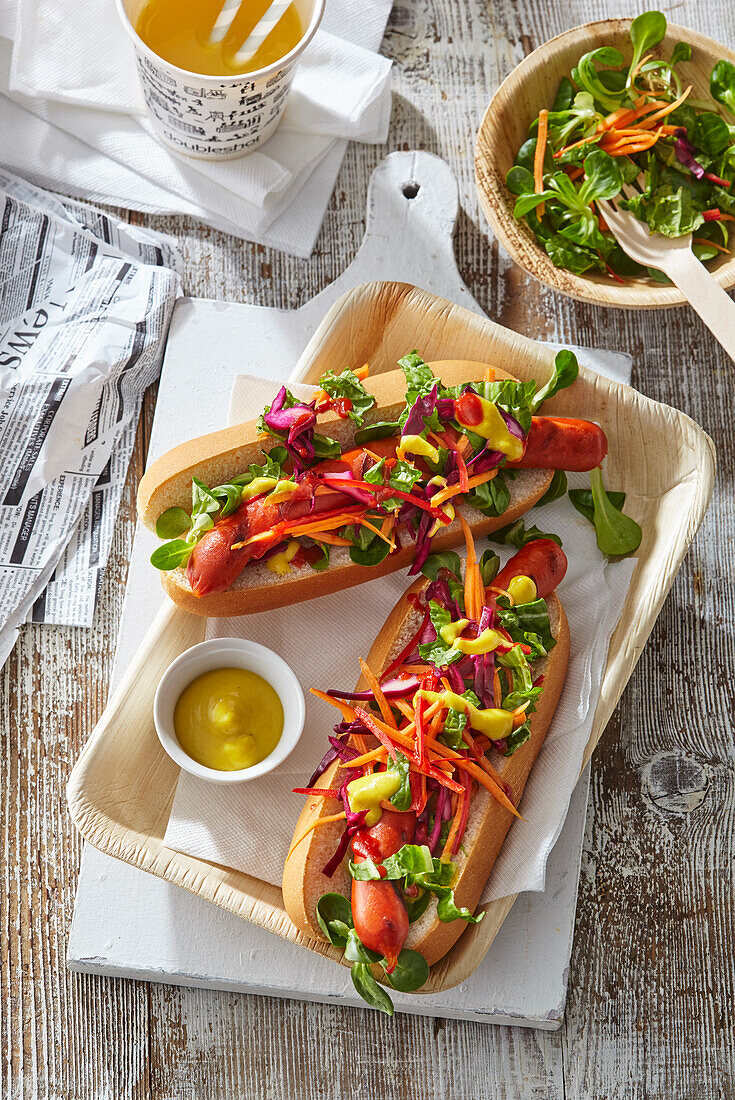 Grilled hot dogs with vegetables