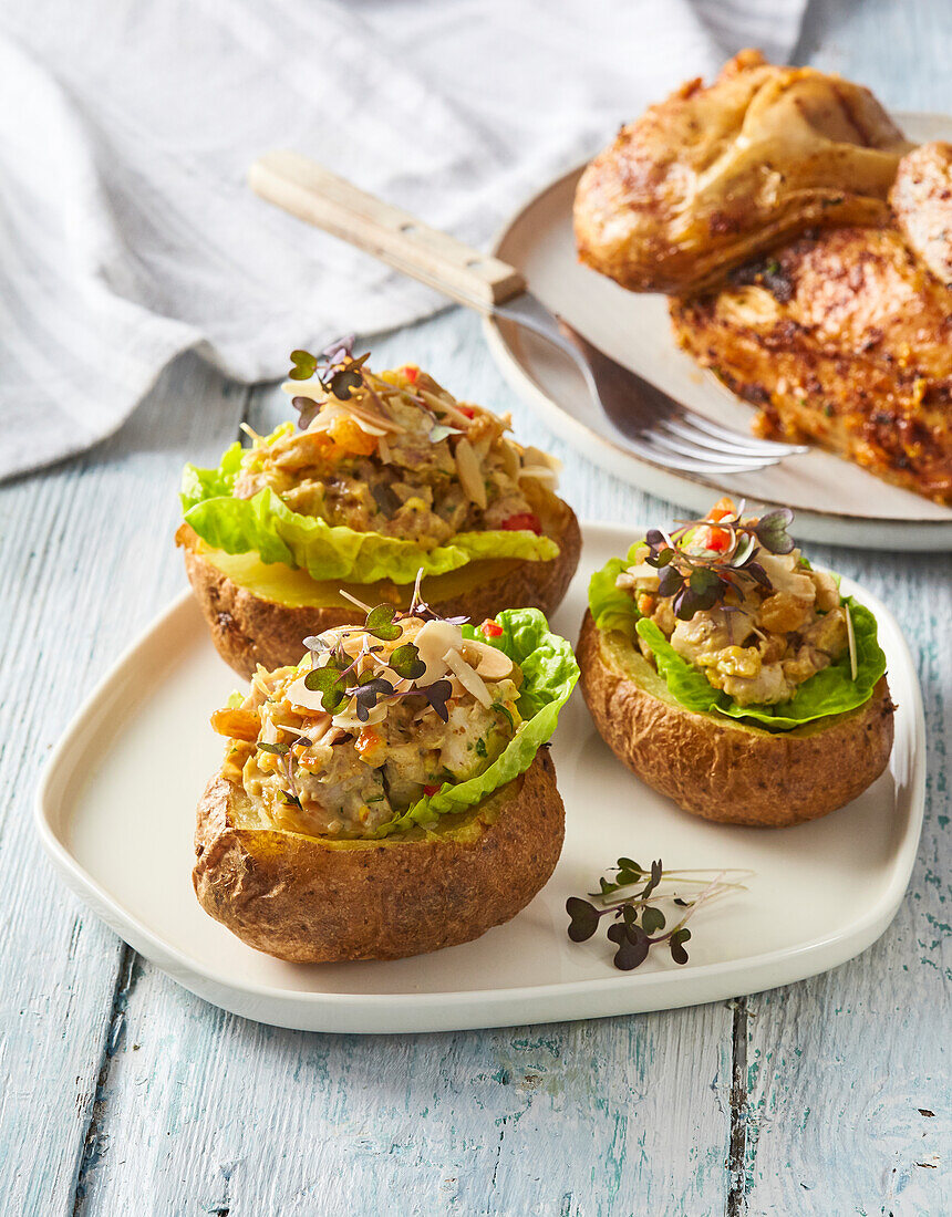 Baked stuffed potatoes stuffed with chicken