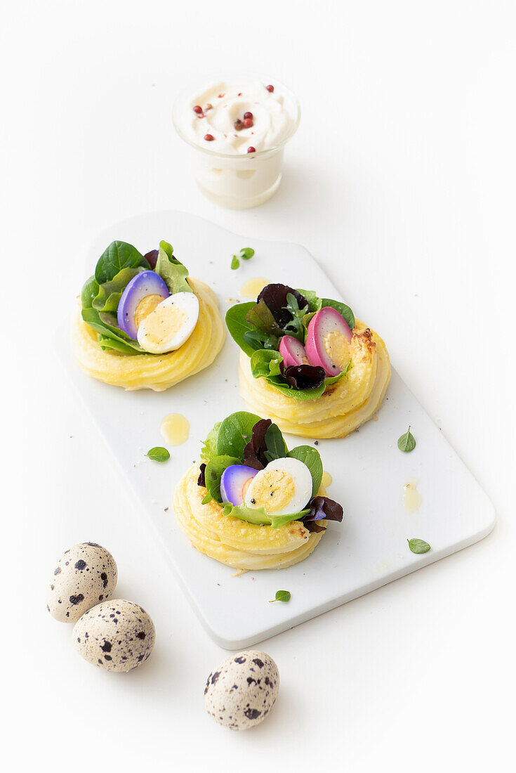 Potatoes with colored quail eggs