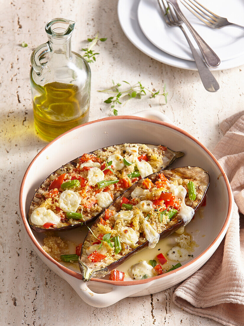 Stuffed eggplant with couscous and cheese