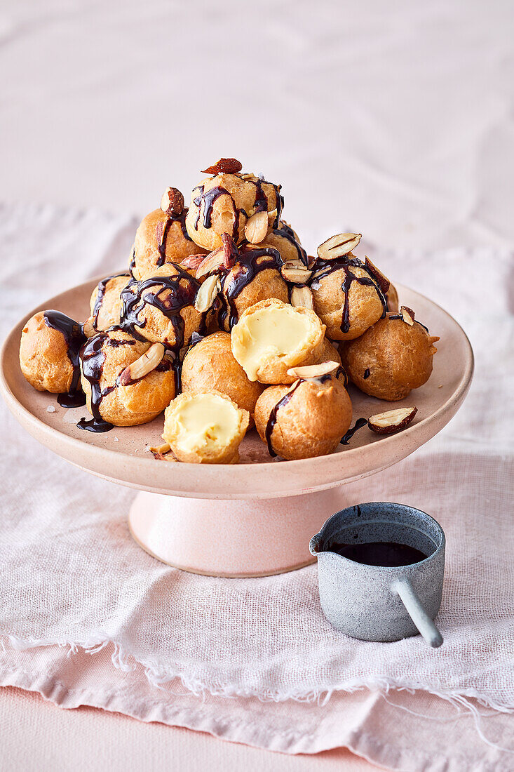 Profiteroles with passion fruit curd filling