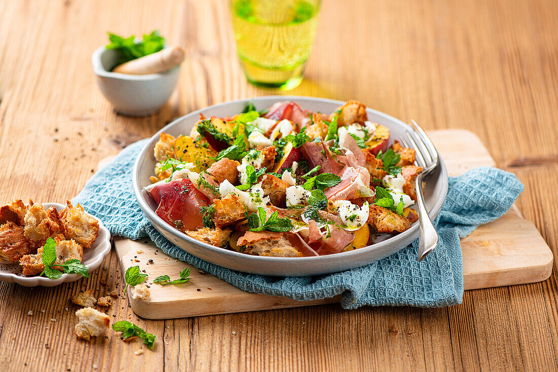 Simple Italian bread salad with tomatoes and peaches