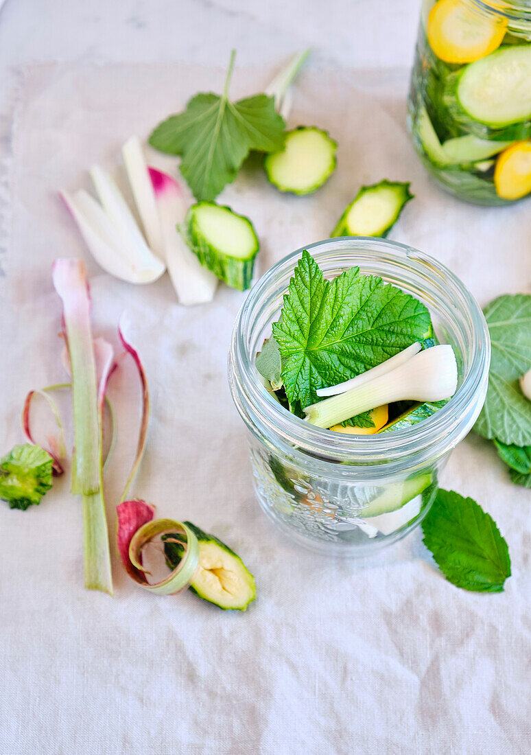 Pickled zucchini with black currant leaves