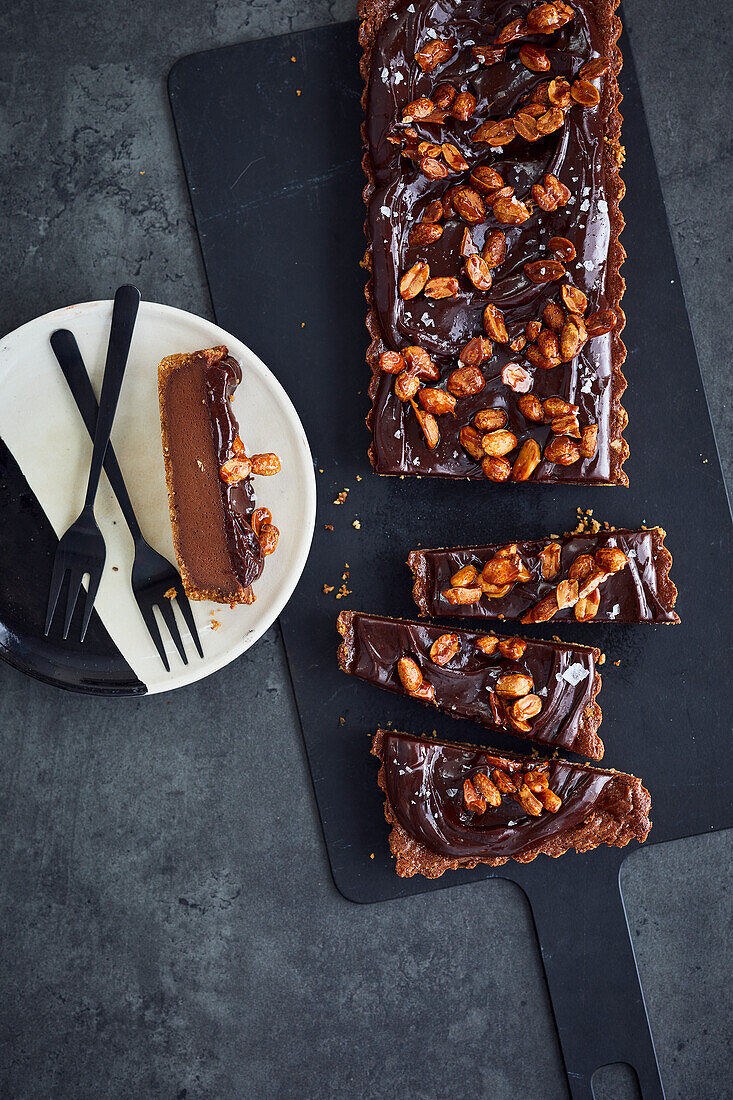 Chocolate cheesecake with pretzel base and caramel peanuts