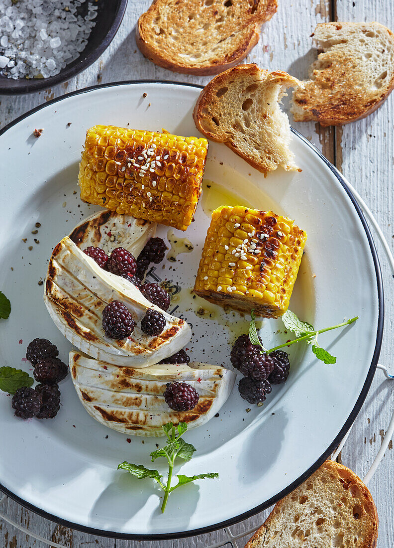 Grilled Brie cheese with blackberries