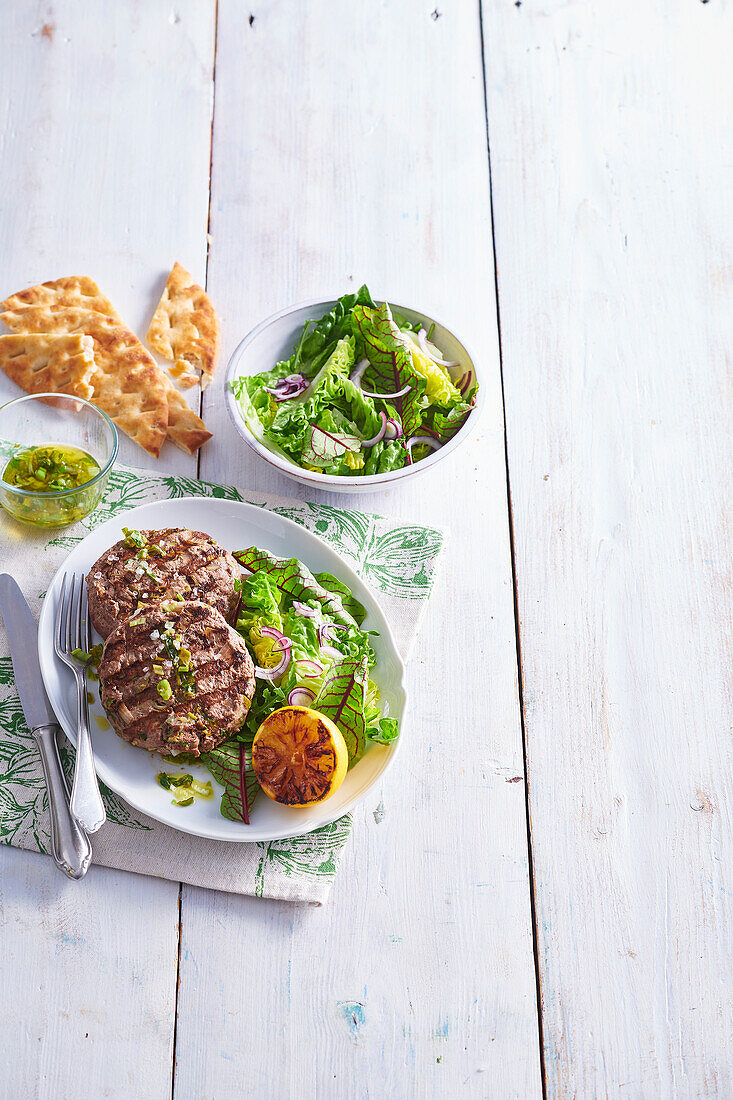 Grilled burgers with lemon balm sauce