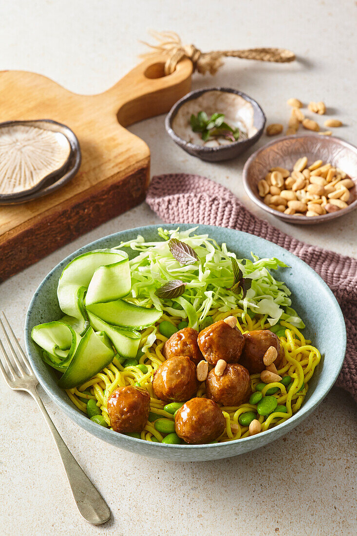 Asian inspired noodle salad with meatballs