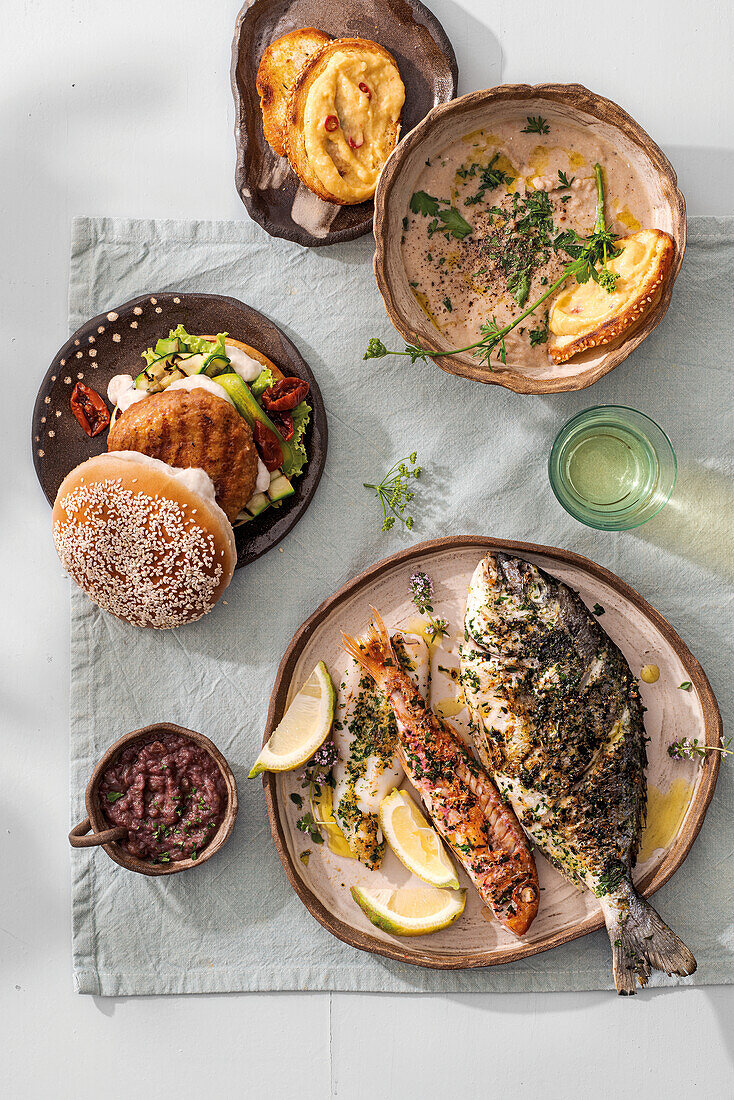 Chicken Burger, Korsische Suppe, Gemischte Meeresfrüchte mit Weinsauce