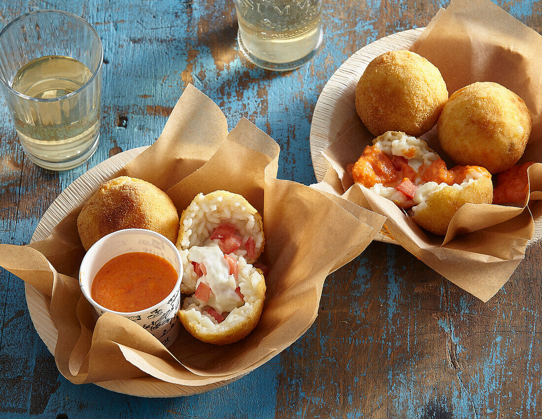 Mozzarella arancini with roasted pepper sauce