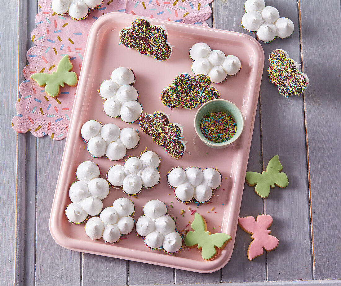 Meringue clouds with chocolate and colored sugar sprinkles