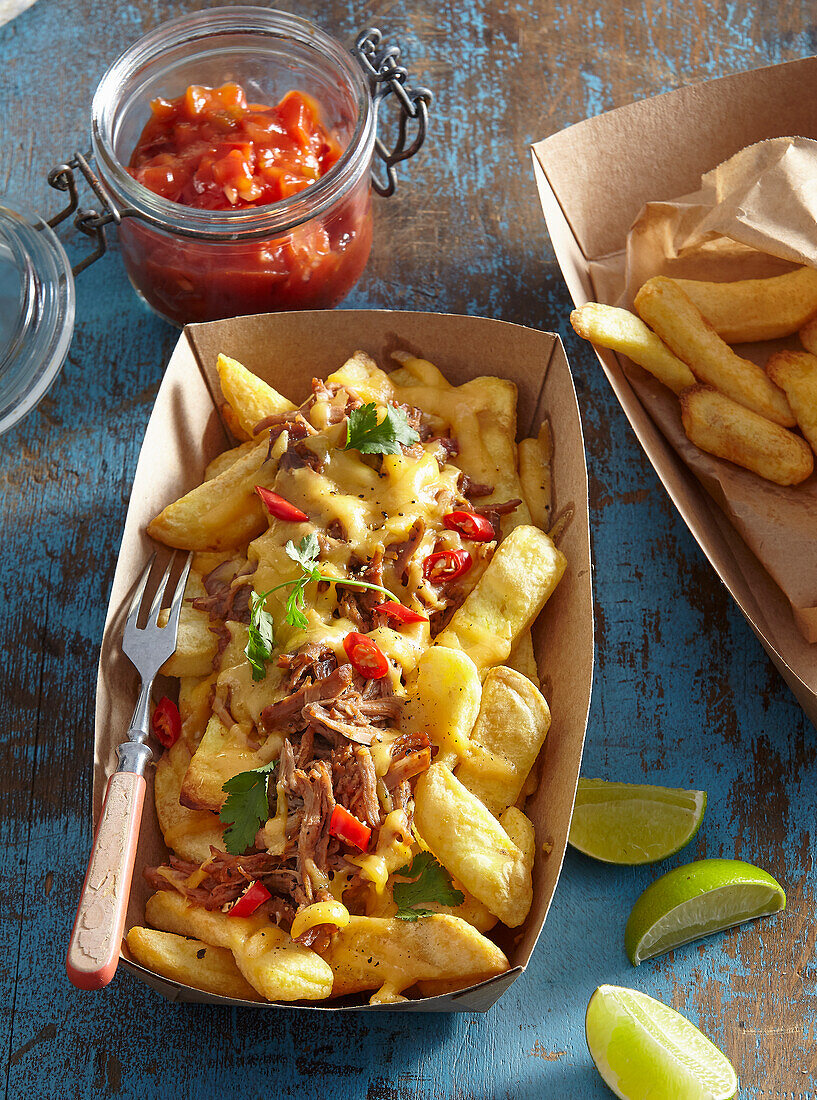 Spicy Pulled Pork with Cheddar Cheese over French Fries