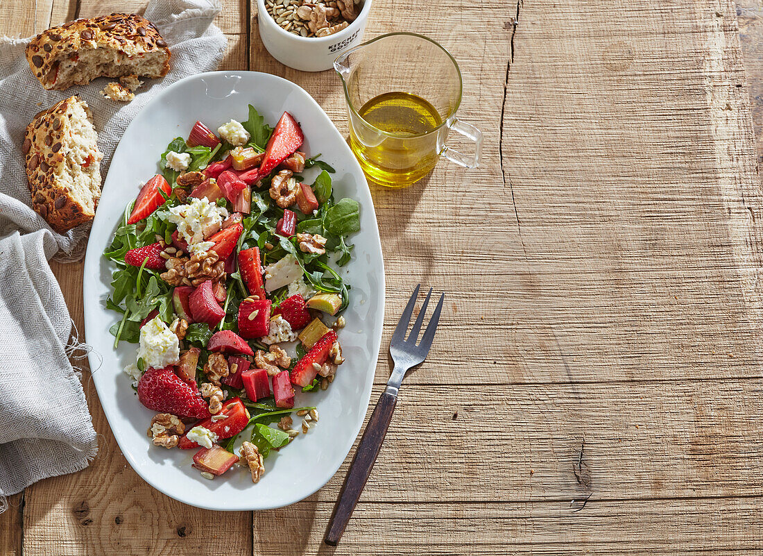 Rhubarb salad with strawberries and feta cheese
