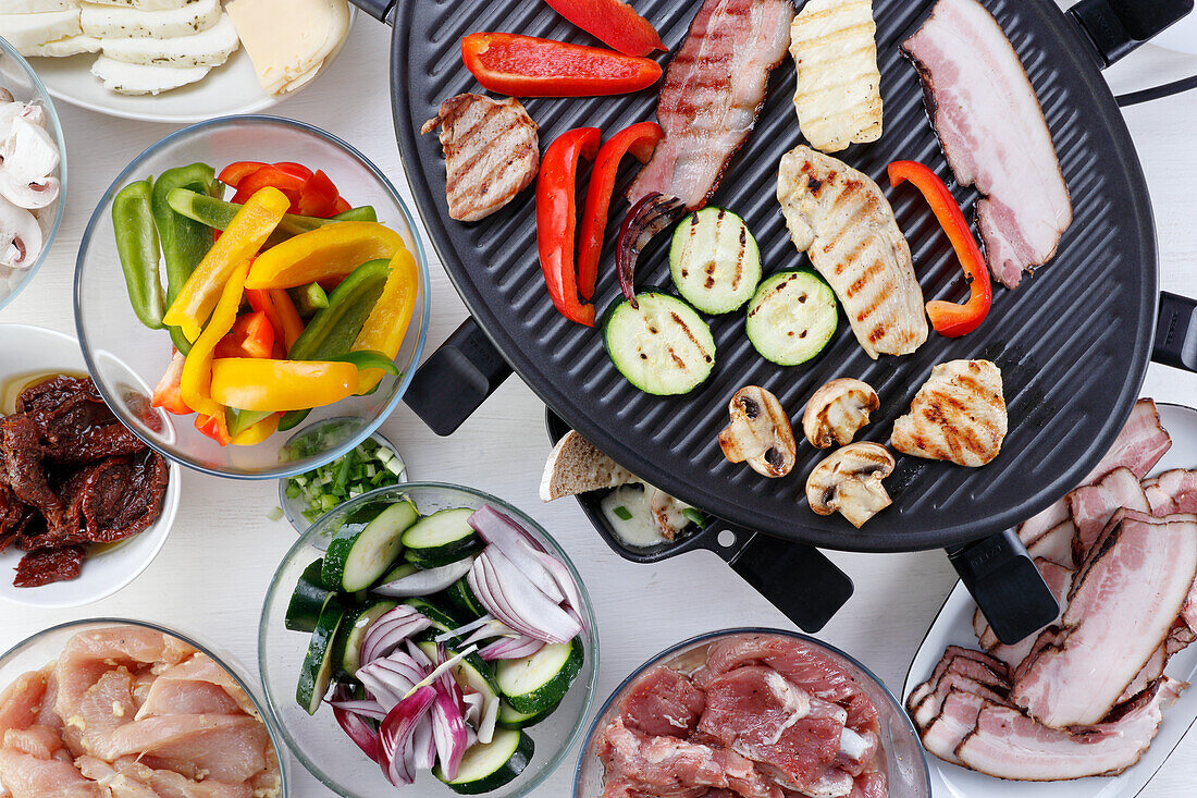 Raclette with meat and vegetables