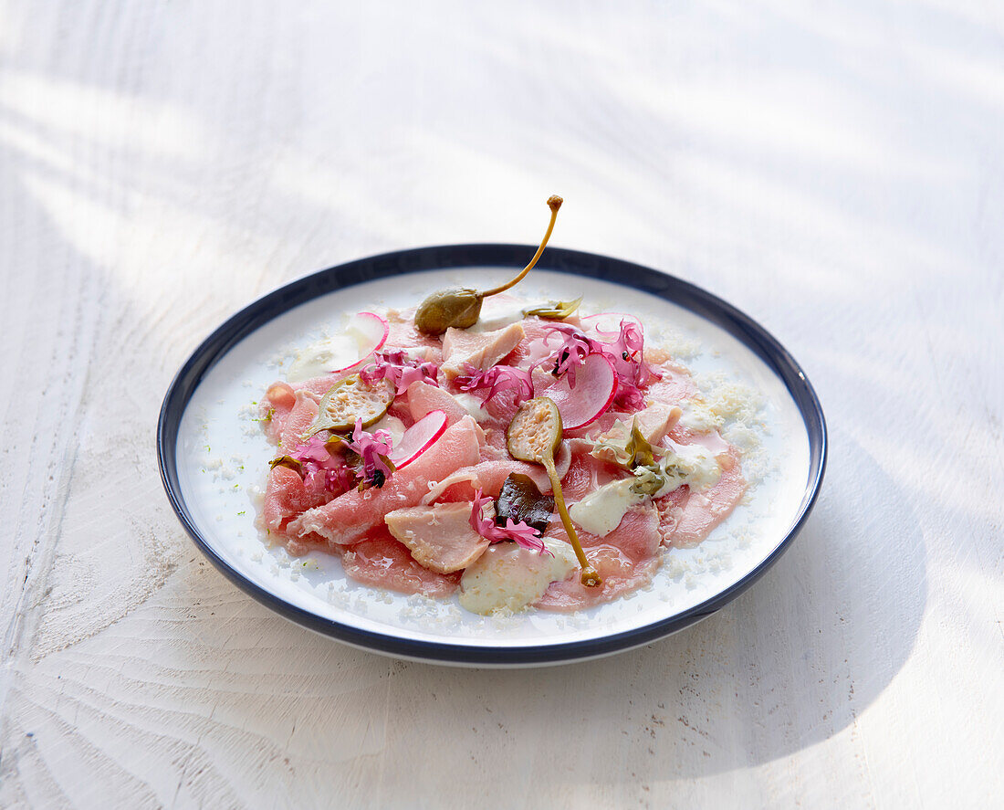 Vitello tonnato with radishes