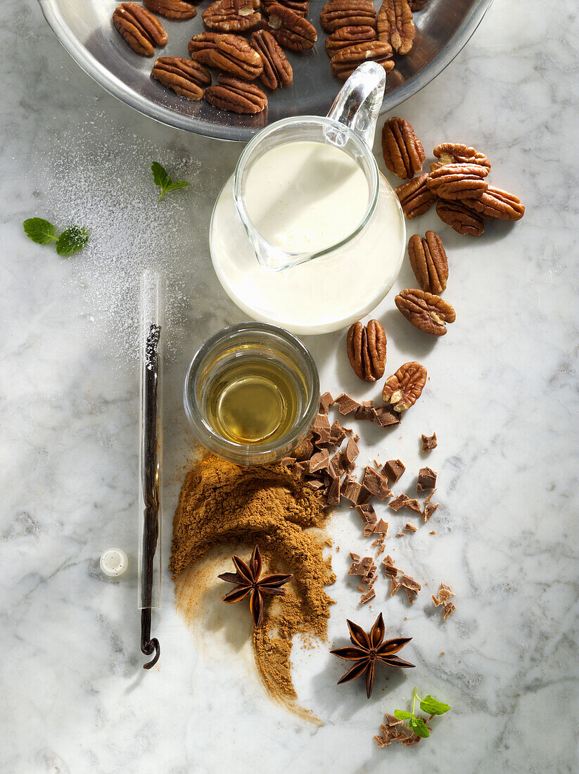 Ingredients for desserts - cream, pecans, vanilla, spices