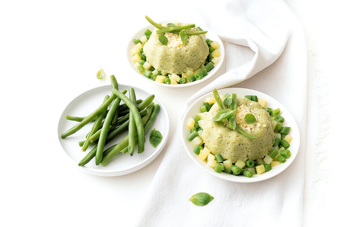 Couscous with pesto, beans, and potatoes