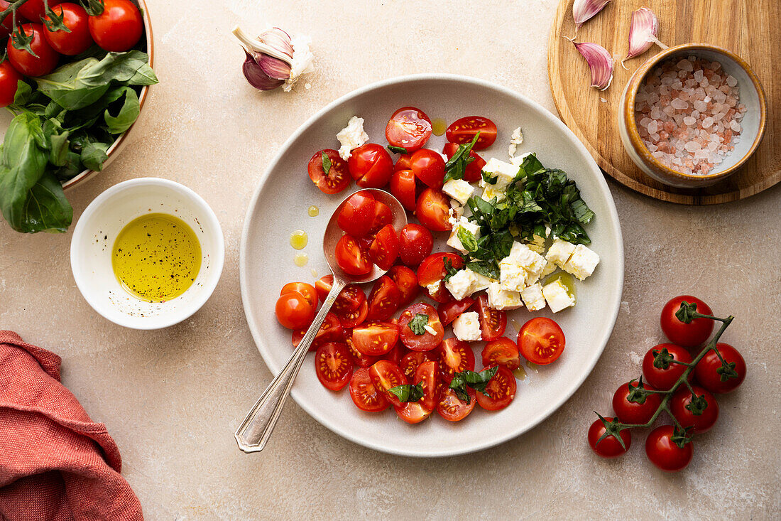 Cherry tomato salad with basil and feta cheese