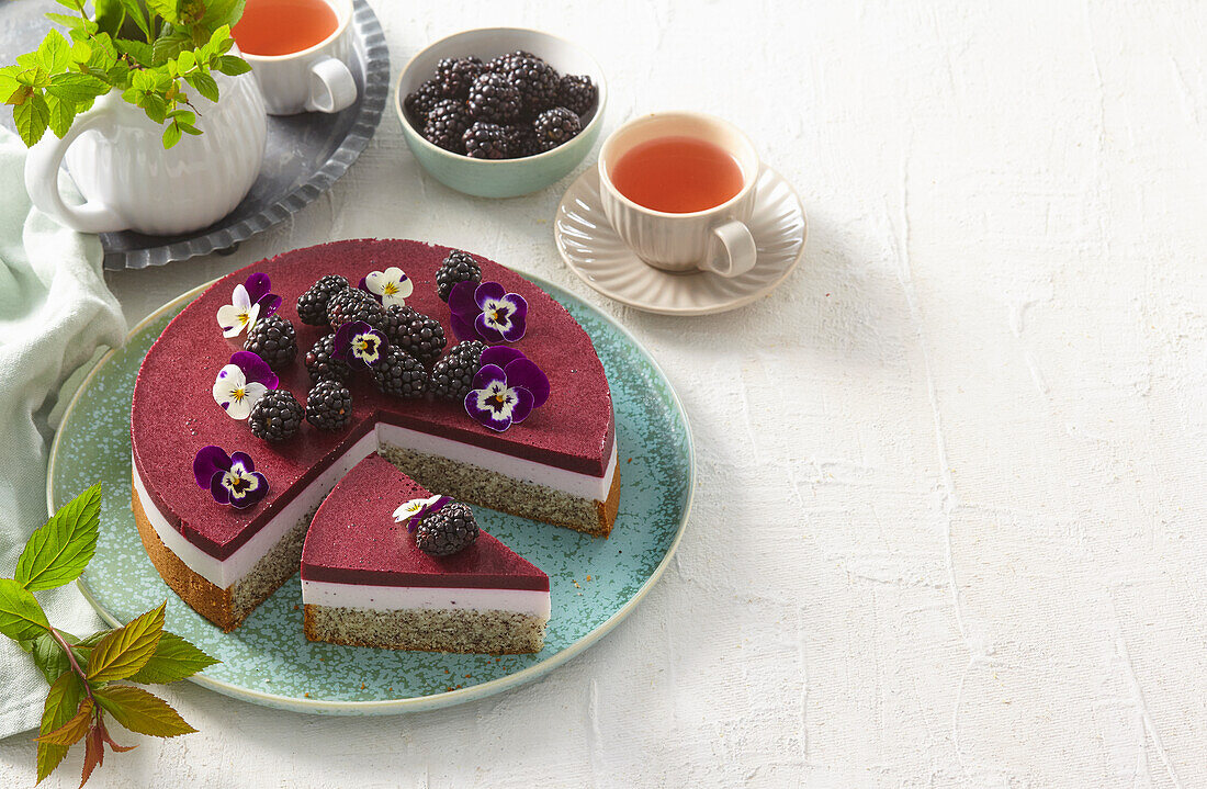 Poppy seed cheesecake with blackberries